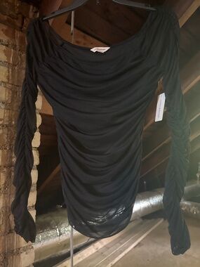 Off the shoulders. Black top